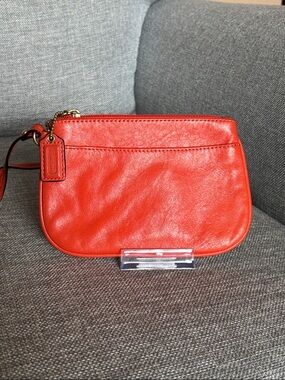 Coach orange Leather Wristlet Clutch with Gold-Tone Hardware